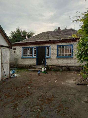 Будинок та земельна ділянка