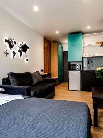 Аренда современных апартаментов в новостройке с балконом