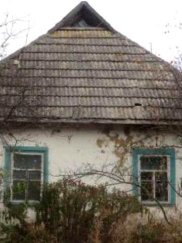 Будинок на земельній ділянці   0,18 га