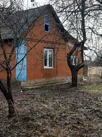 Продам земельну ділянку з будинком