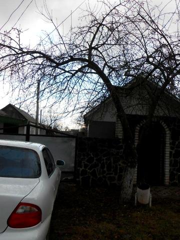 Магазин з будинком