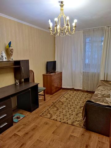 Олімпійська вул., 13