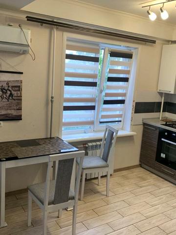 Олімпійська вул., 20