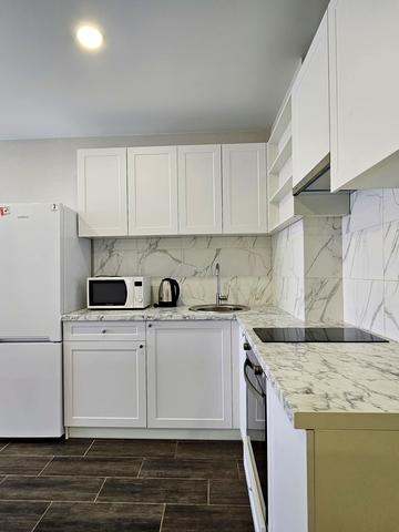 Олега Мудрака вул. (Генерала Наумова), 1-Б