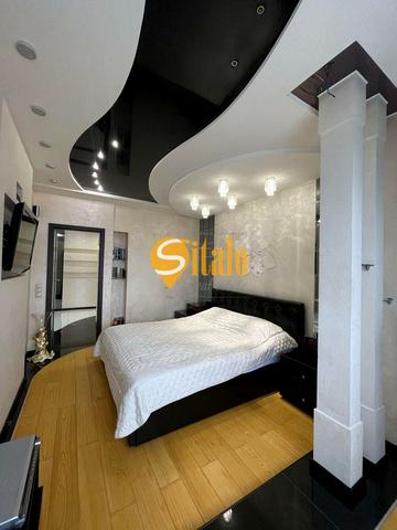 Дніпровська набережна вул., 26