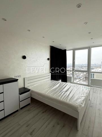 Олега Мудрака вул. (Генерала Наумова), 1-Б