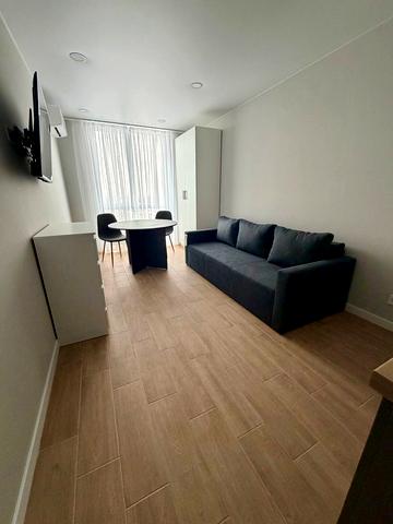 Олега Мудрака вул. (Генерала Наумова), 1-Б