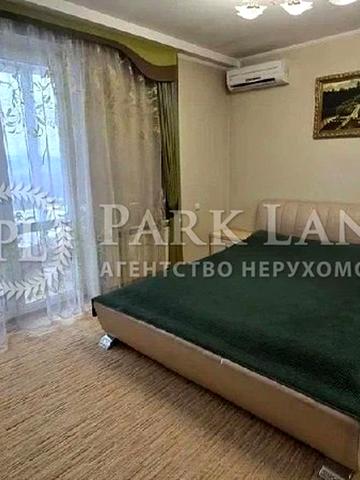 Дніпровська набережна вул., 1