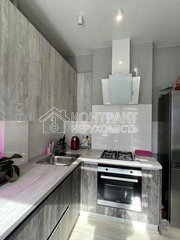 Павлівський майдан пл. (Рози Люксембург майдан), 2