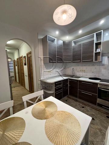 Райдужна вул., 65