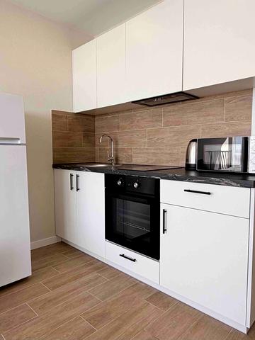 Олега Мудрака вул. (Генерала Наумова), 1-Б