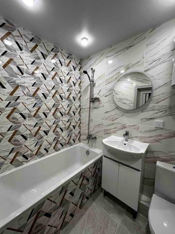 Космонавтів вул., 84