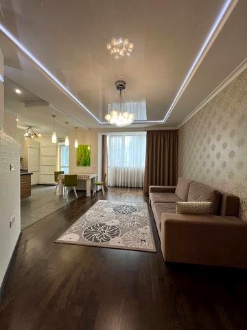 Євгена Коновальця вул., 124А