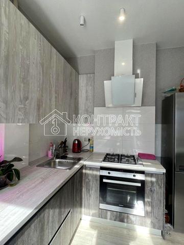 Павлівський майдан пл. (Рози Люксембург майдан), 2