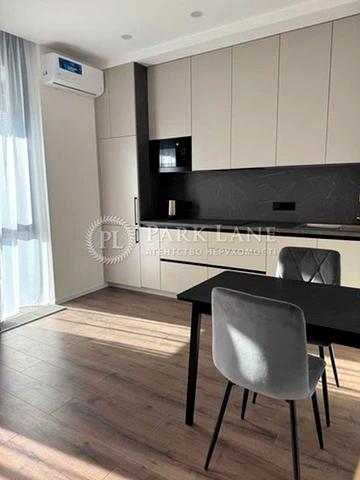 Ґарета Джонса вул. (Сімї Хохлових), 12