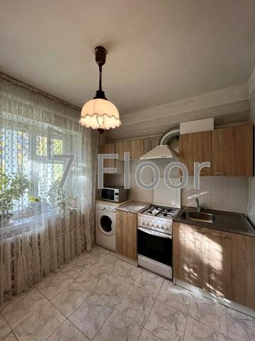 Євгена Коновальця вул. (Щорса), 35