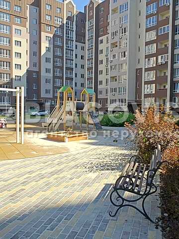 Леоніда Каденюка вул., Будинок Лион