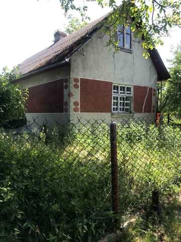 біля Школи