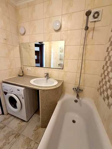Героїв 128-ї Бригади вул. (8 Березня), 36