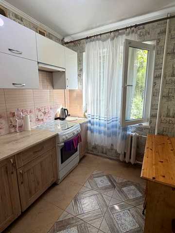 Євгена Танцюри вул. (Генерала Петрова), 44