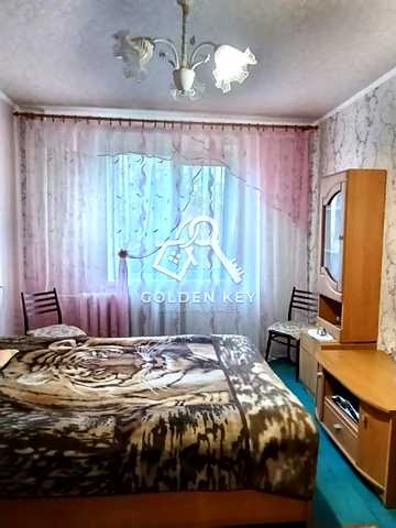 Космонавтів вул., 27
