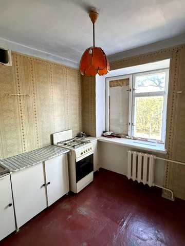 Космонавтів вул., 65