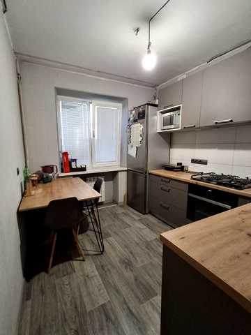 Академіка Корольова вул., 21