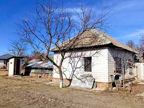 будинок за адресою Дніпровська