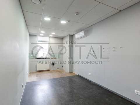 комерційна за адресою Спаська вул., 12