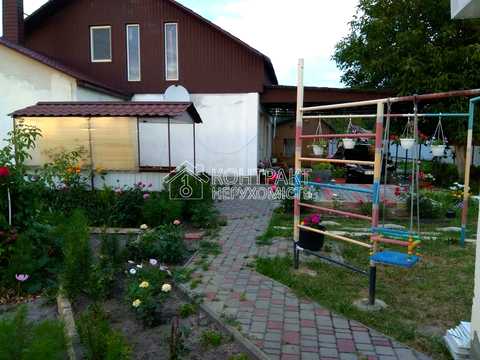 будинок за адресою смт. Безлюдівка, Зміївська вул., 34