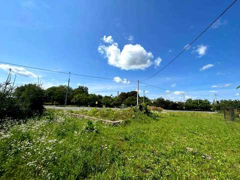 участок по адресу Корнії