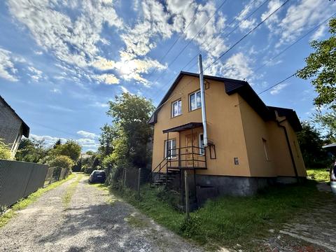 будинок за адресою с. Скнилів, Зарічна