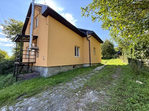 будинок за адресою с. Скнилів, Зарічна