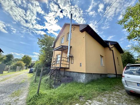 будинок за адресою с. Скнилів, Зарічна