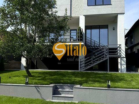 будинок за адресою Листопадна вул.