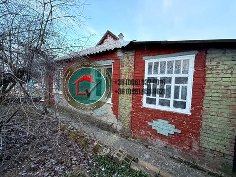 будинок за адресою смт. Коротич, Покровська вул., 11