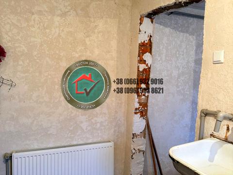 будинок за адресою смт. Коротич, Покровська вул., 11