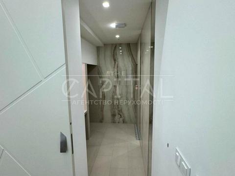 комерційна за адресою Володимирська вул., 48