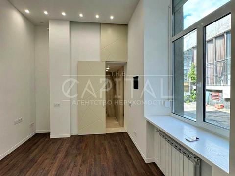 комерційна за адресою Володимирська вул., 48