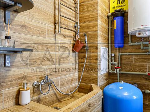 будинок за адресою с. Крюківщина, Георгія Мальцева вул., 1