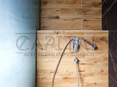 будинок за адресою с. Крюківщина, Георгія Мальцева вул., 1