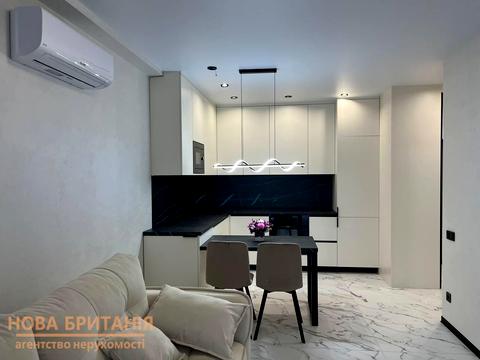 квартира за адресою Михайла Максимовича вул. (Онуфрія Трутенка), (Будинок «Віндзор»)