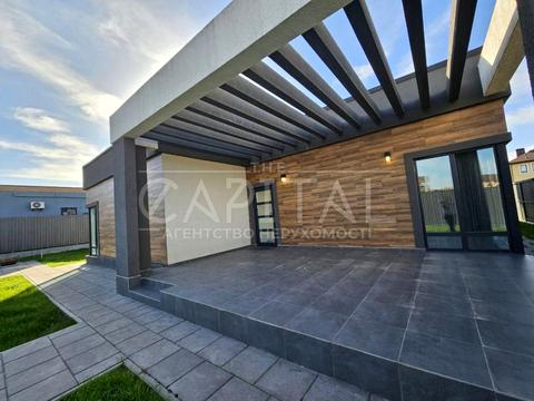 дом по адресу Орхідейна