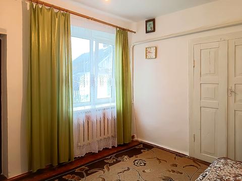 будинок за адресою с. Курозвани, Центральна