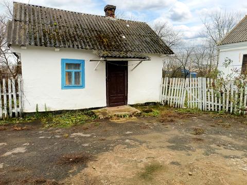 будинок за адресою с. Курозвани, Центральна