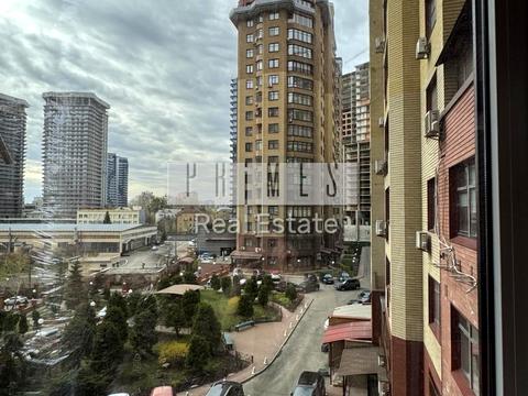 комерційна за адресою Євгена Коновальця вул. (Щорса), 32-Б