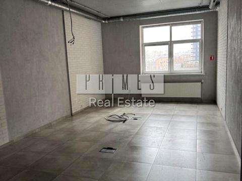 комерційна за адресою Євгена Коновальця вул. (Щорса), 32-Б