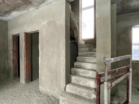 будинок за адресою Коновальця