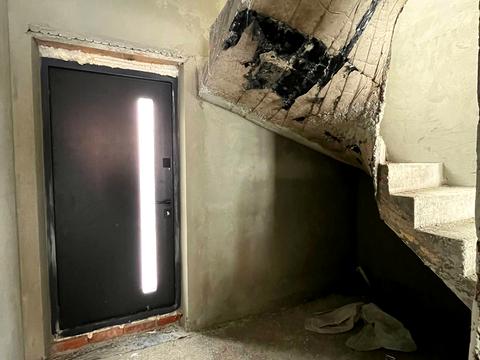 будинок за адресою Коновальця