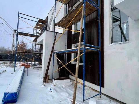 будинок за адресою Коновальця